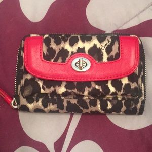 Coach cheetah print wristlet wallet.